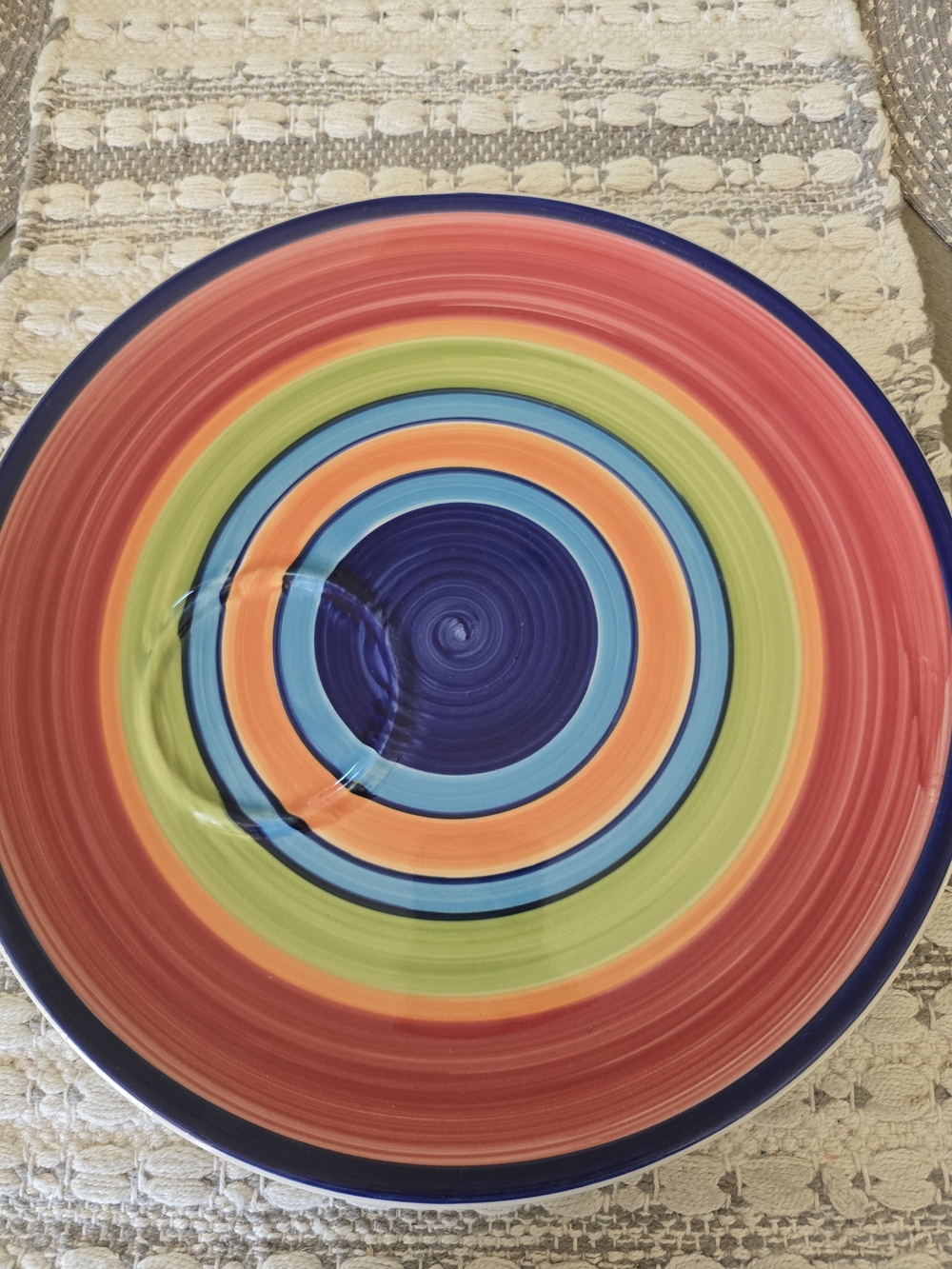 Cost Plus World Market White Ceramic Plate with Black Logo